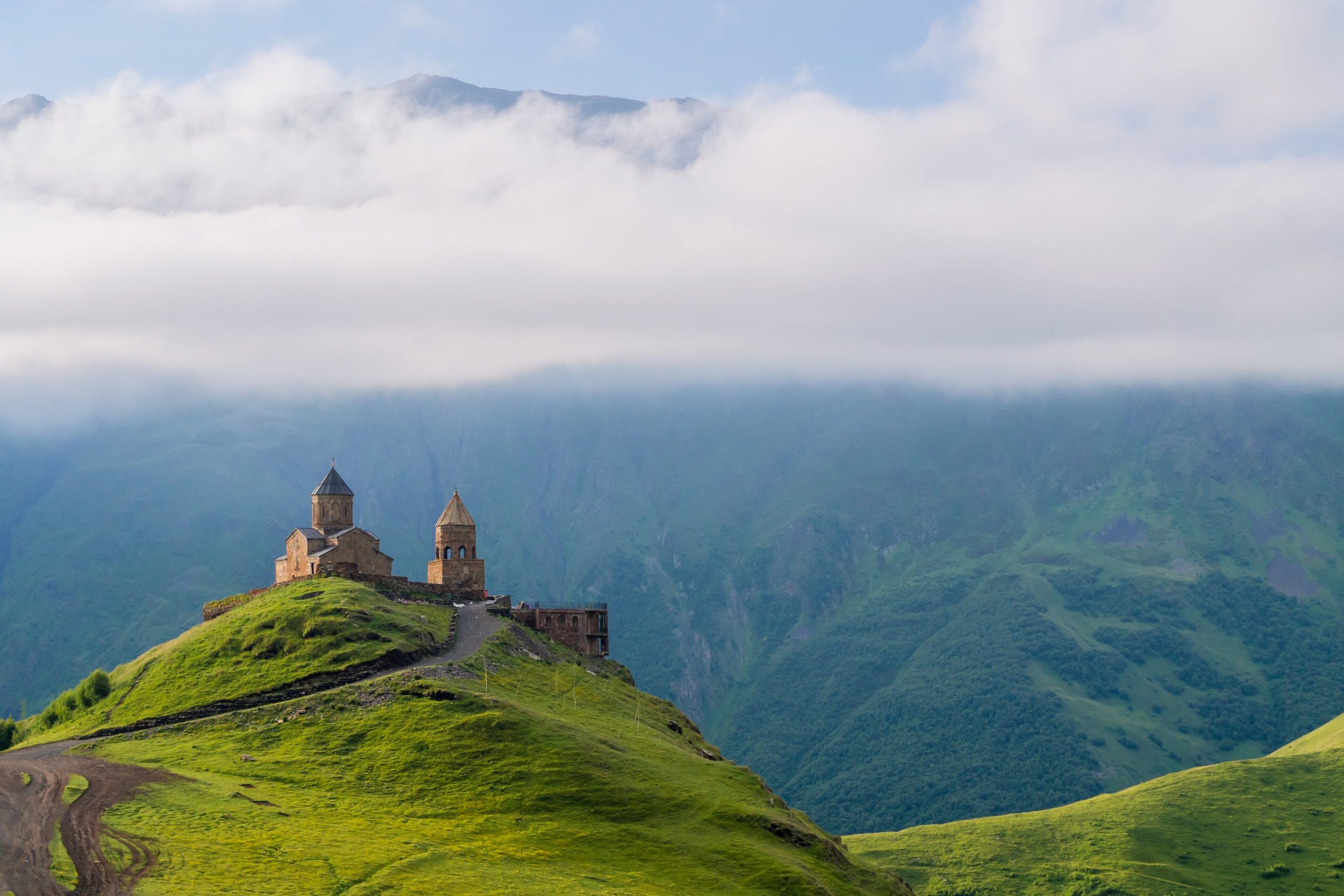 Colorful,Horizontal,Photo,Of,Gergeti,Tsminda,Sameba,Church,In,Kazbegi